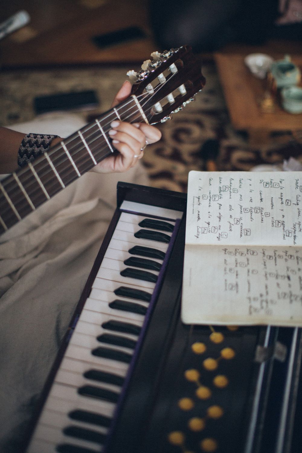 Guitar and keyboard, Photo by Elina Sazonova: https://www.pexels.com/photo/person-playing-guitar-with-musical-notes-3971985/