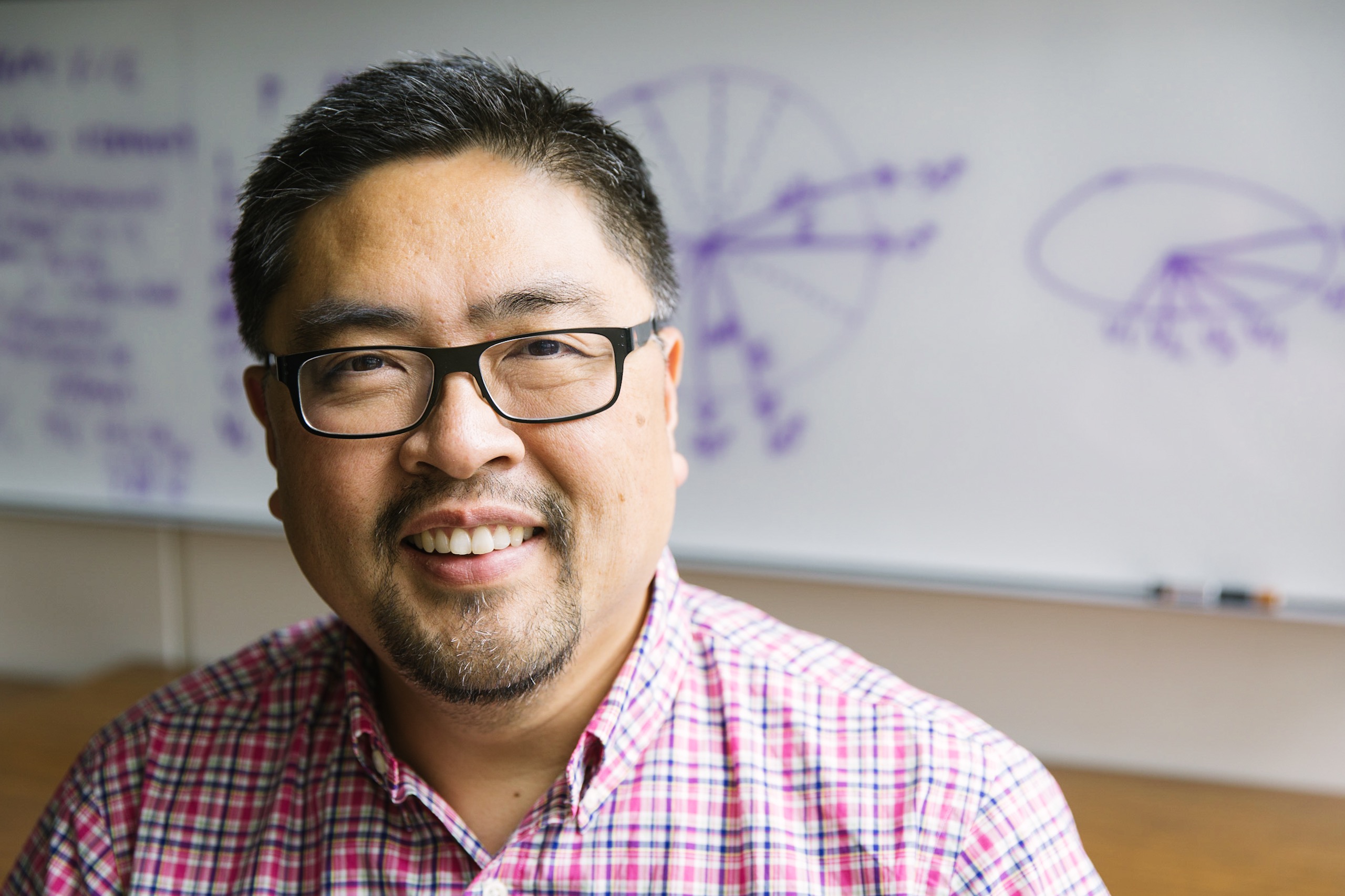 A headshot of Dr. John Choe