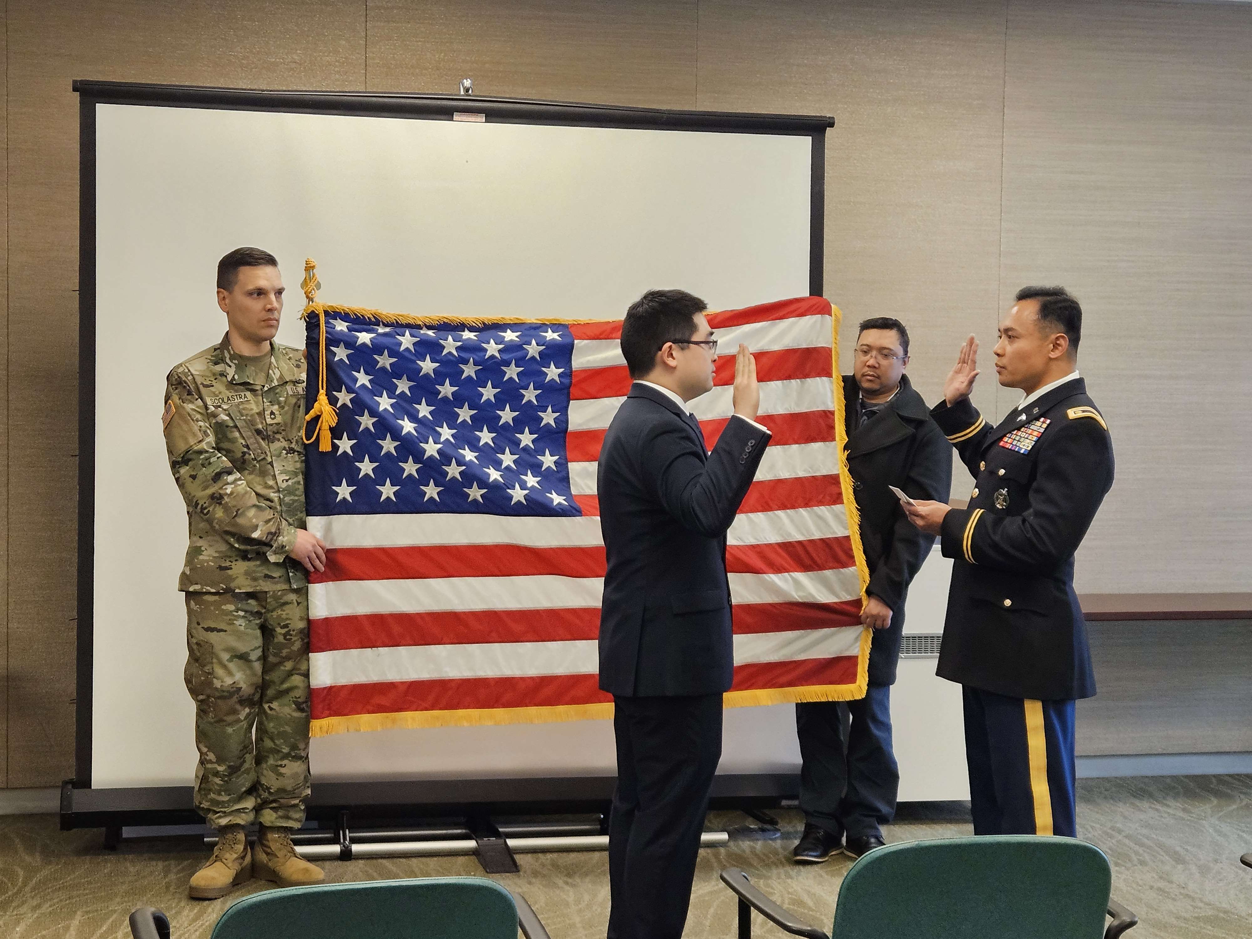 Dr. James Sze being commissioned into the Army Reserves