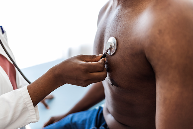 Black patient with stethoscope on chest