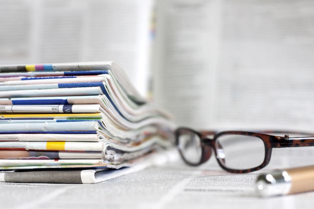 Stack of papers and glasses