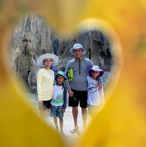 Radhika Narla's family through a heart shaped filter