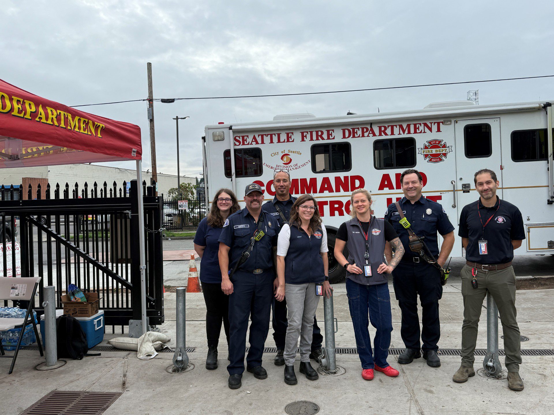 Pop up staff in the park in front of mobile health van