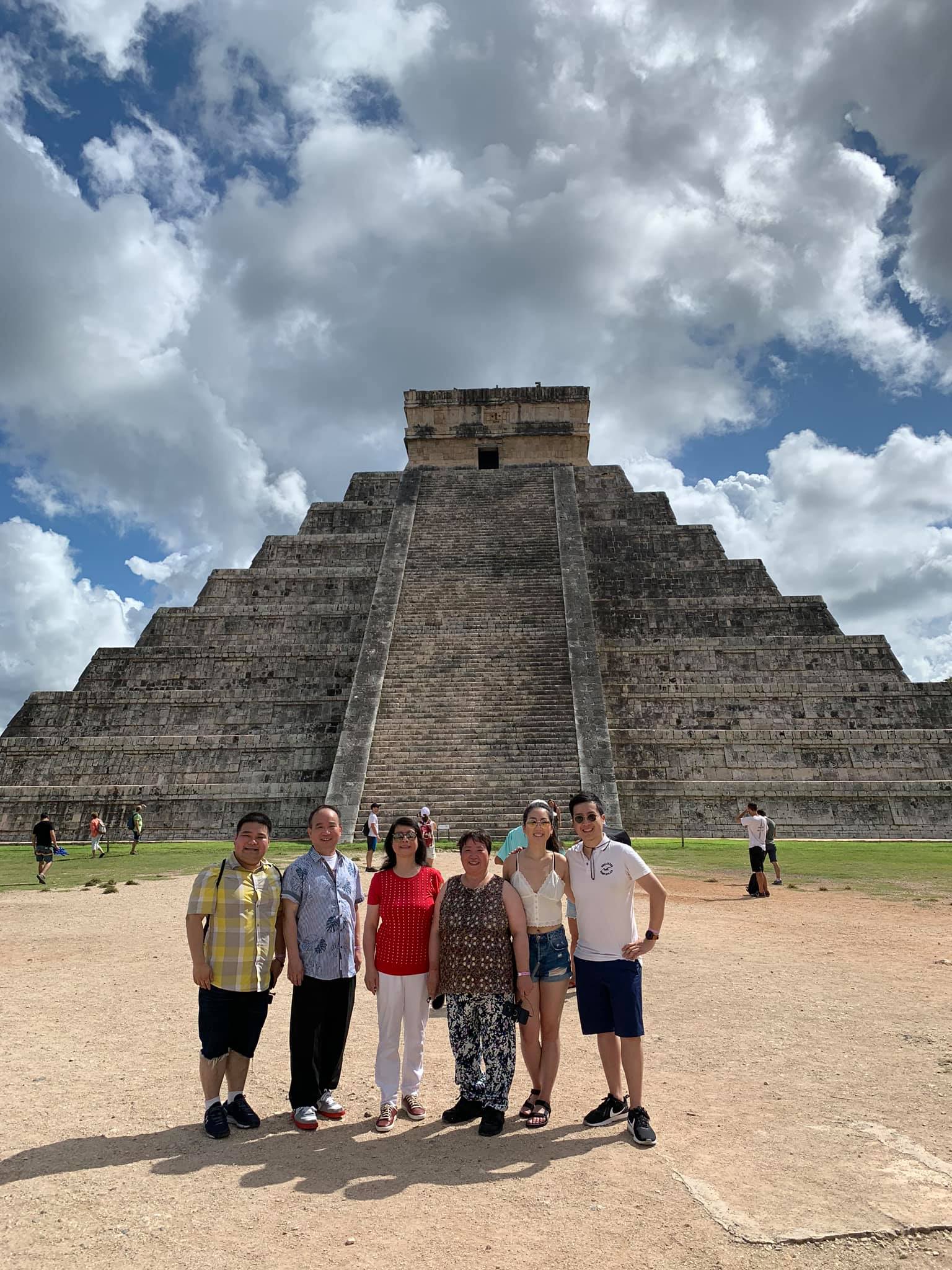 Chen (left) with his family at Chichén Itzá, 2019