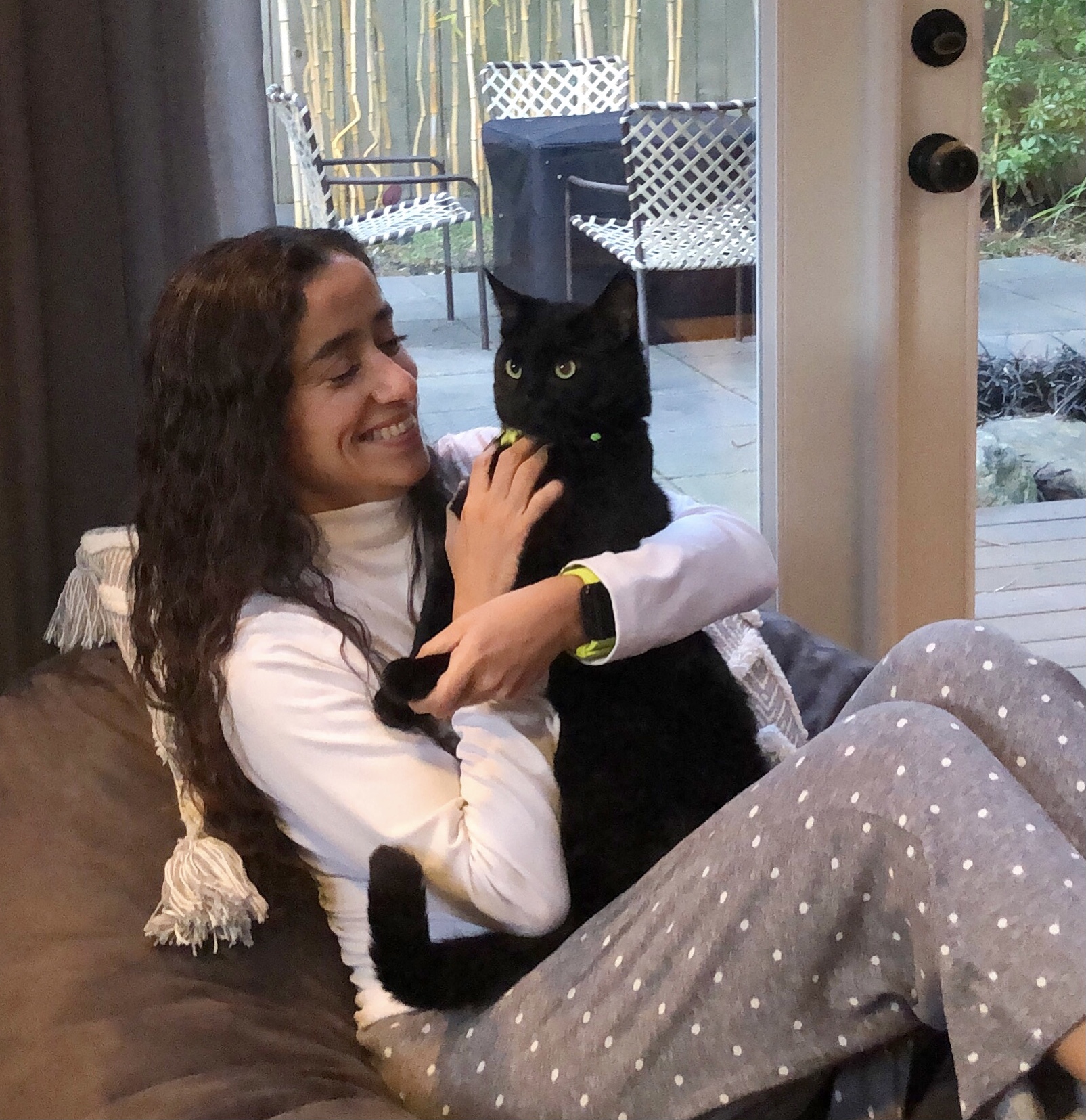 Dr. Wright with her cat, Barack