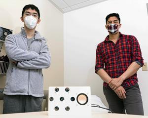 Lead author Anran Wang, left, and co-author Dr. Dan Nguyen stand with the smart speaker prototype.