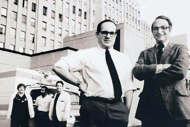 Drs. Michael Copass, left, and Leonard Cobb at Harborview Medical Center with a Medic One crew.