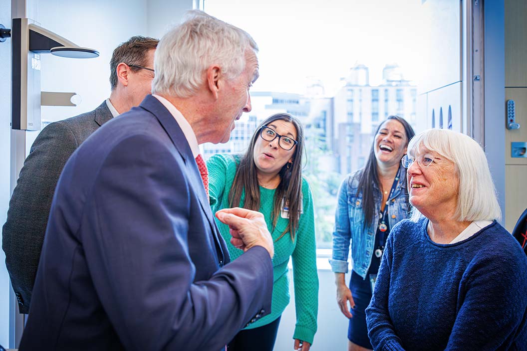 Sen. Patty Murray, right, visits with Fred Hutch President and Director Dr. Thomas J. Lynch Jr. during her tour of the Bezos Family Immunotherapy Clinic in June. Photo by Robert Hood / Fred Hutch News Service