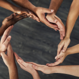 Hands forming a circle