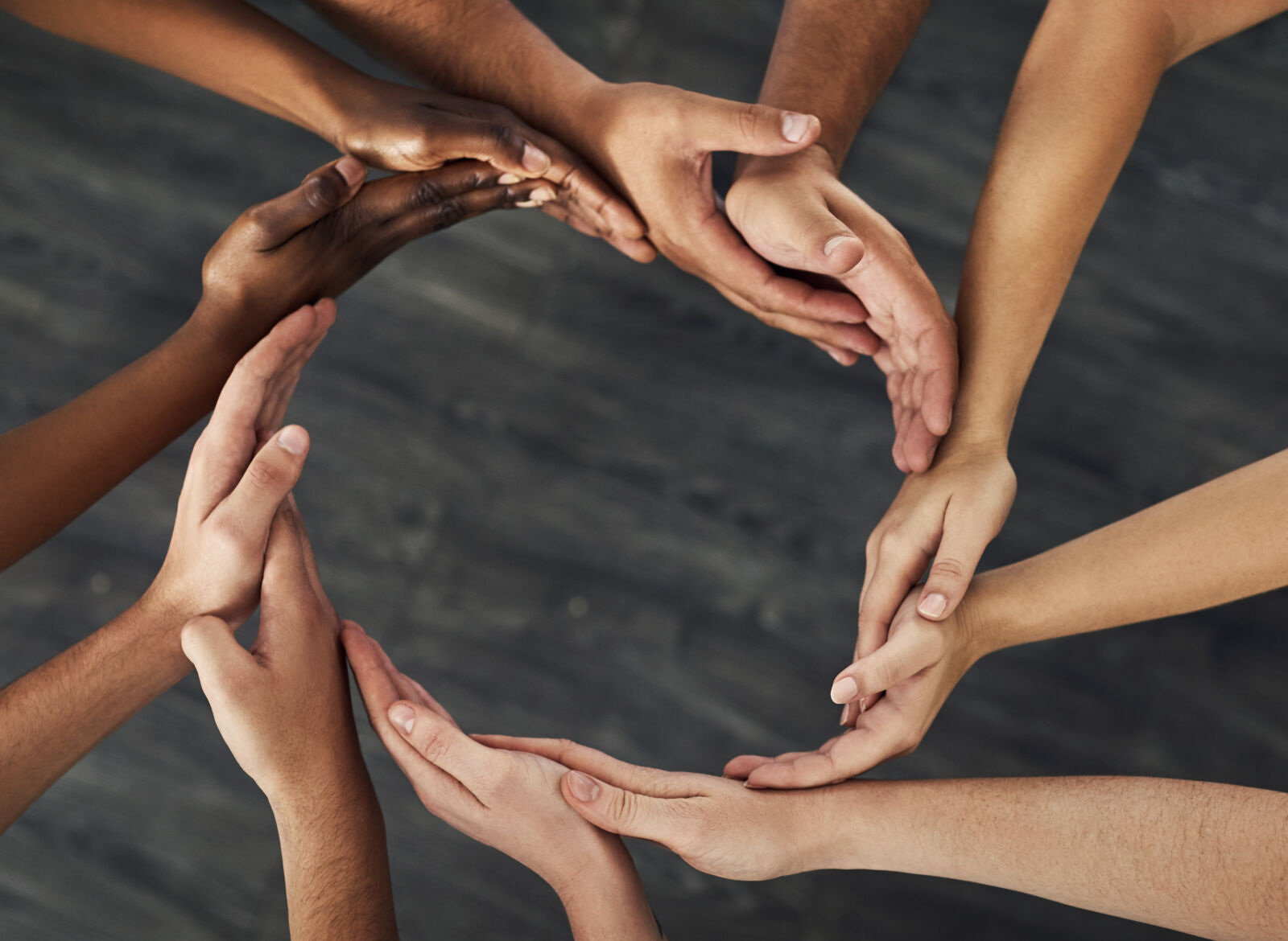 Hands forming a circle