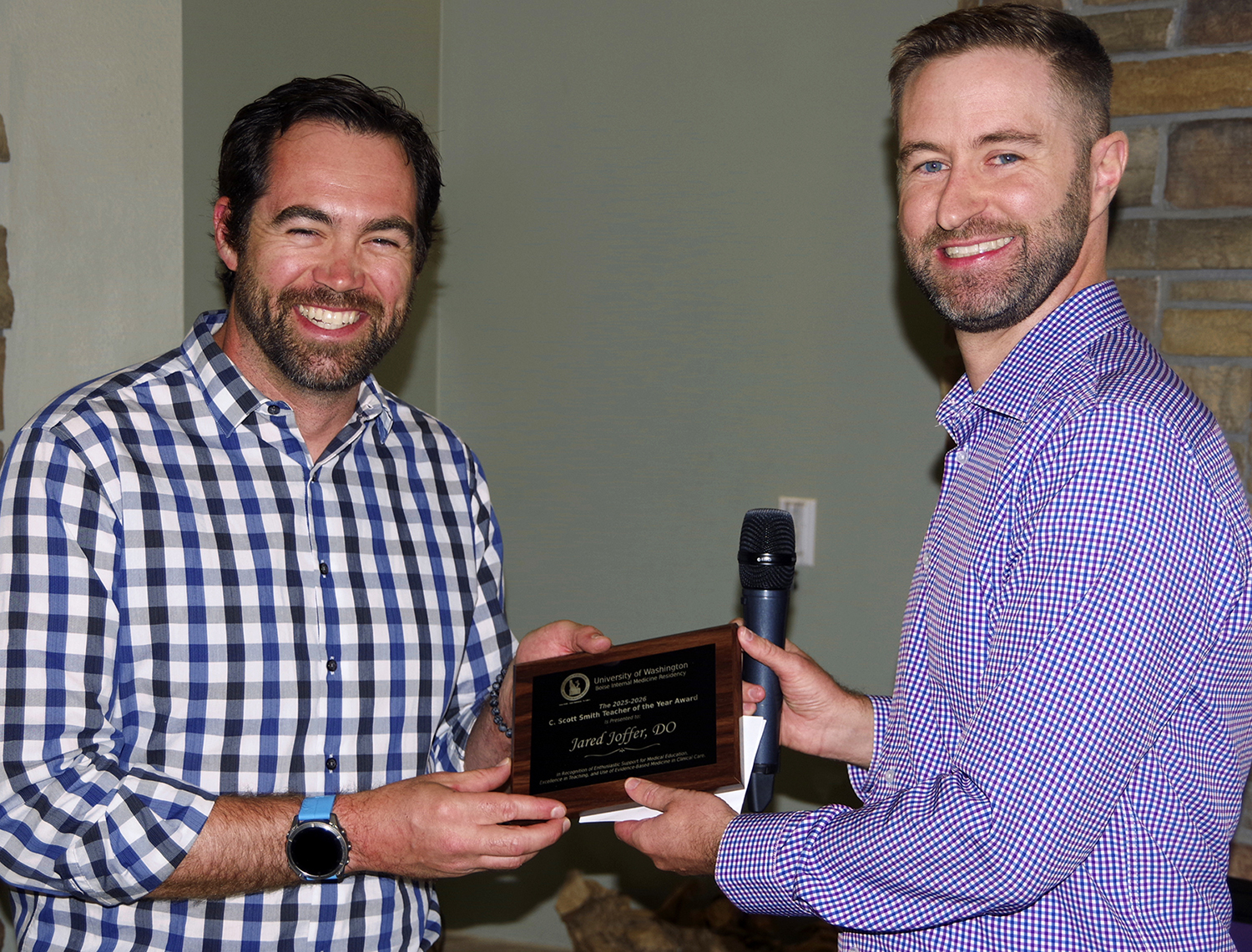 Dr. Joffer receiving the award from Dr. Bird
