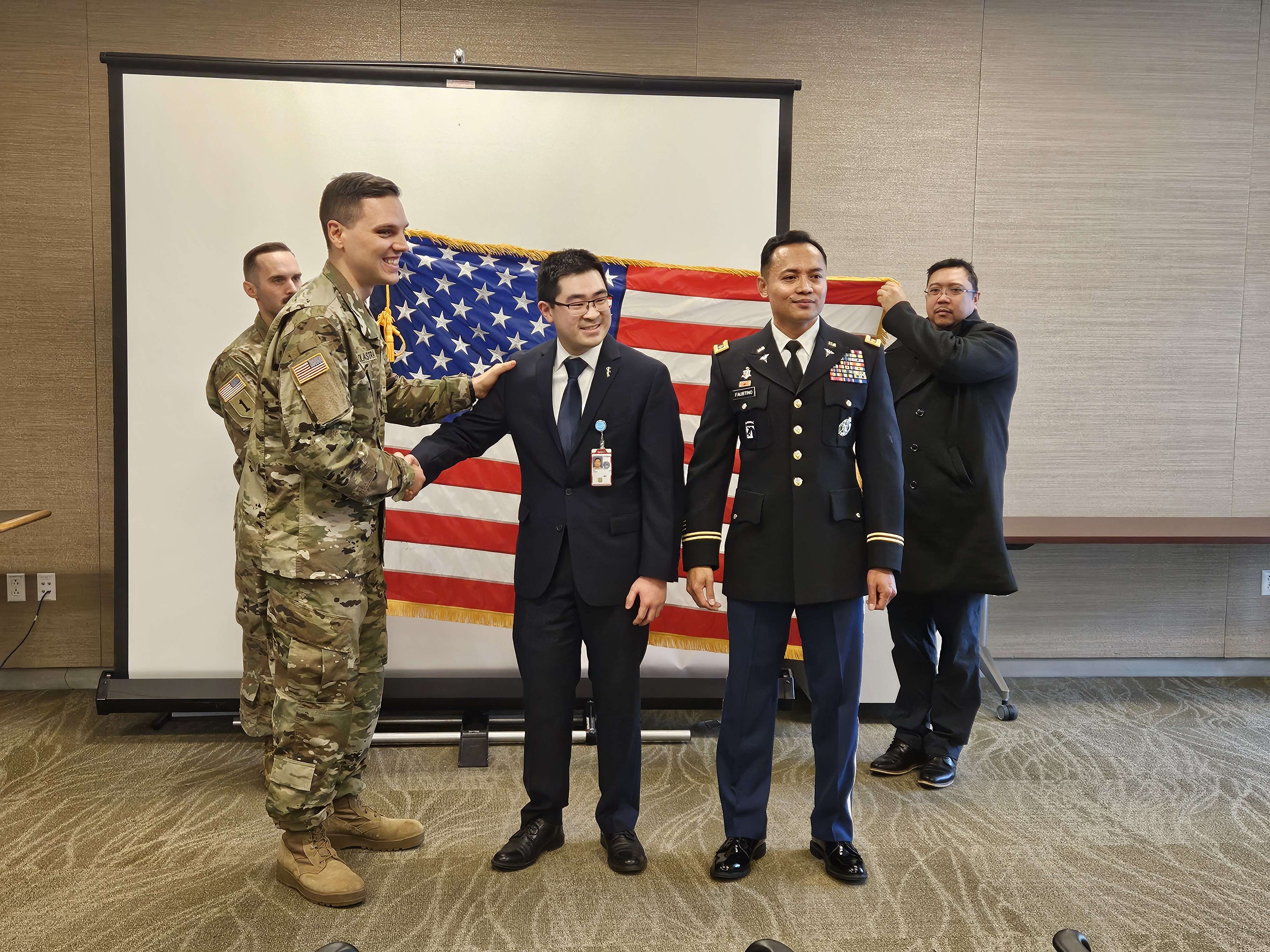 Sze taking his Oath of Service