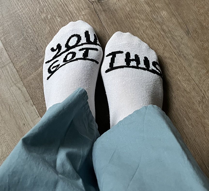 Socks with "you got this" on them